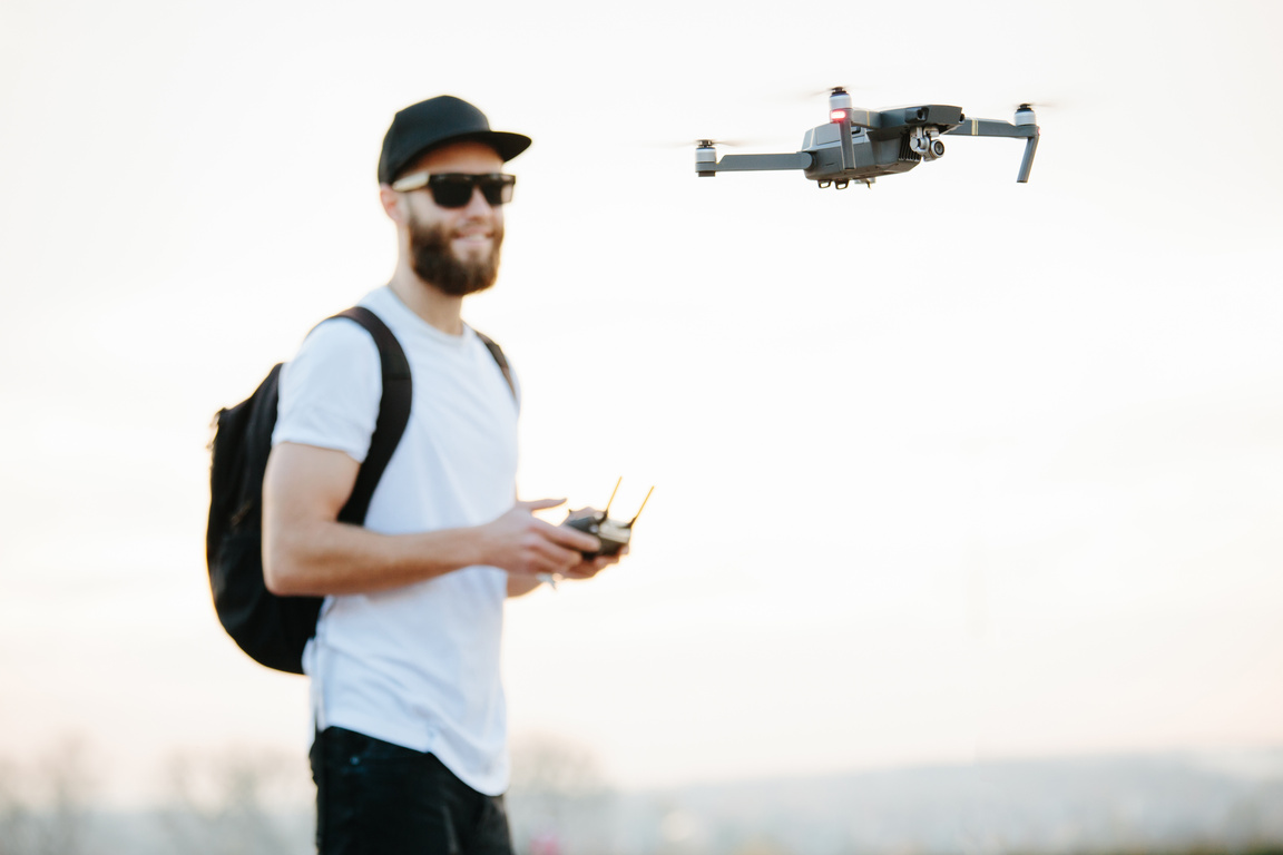 Man Flying a Drone